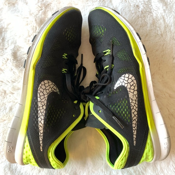 yellow black tennis shoes